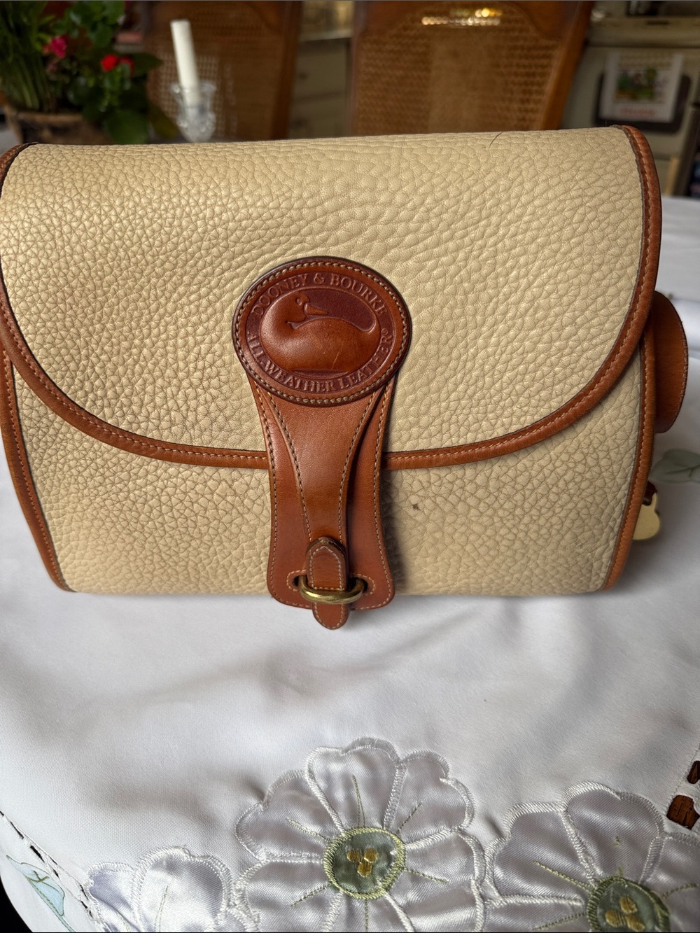 Dooney & Bourke Cream Pebbled Leather Crossbody with Brown Trim